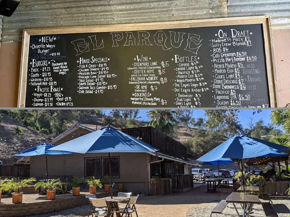 Outdoor patio tables beside a restaurant entrance.