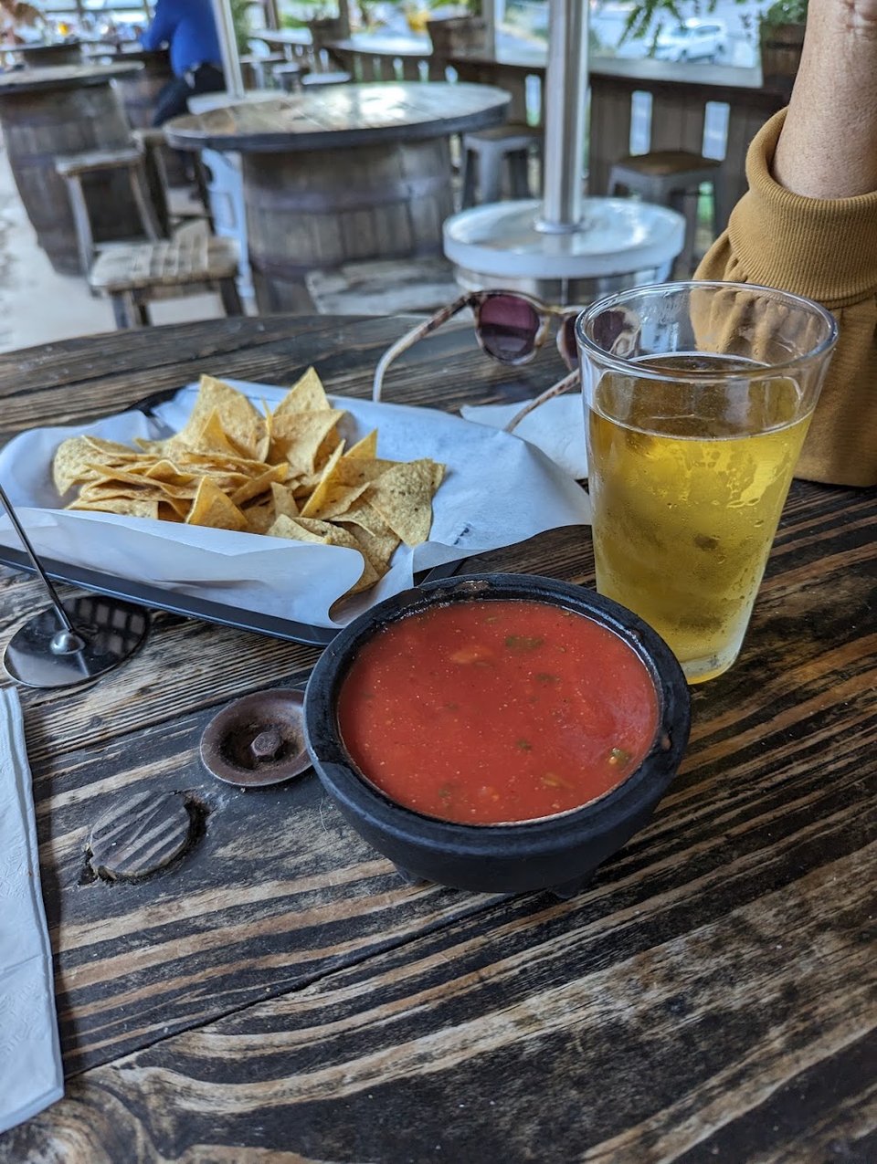 Printed menu with burritos, tacos, and plates.